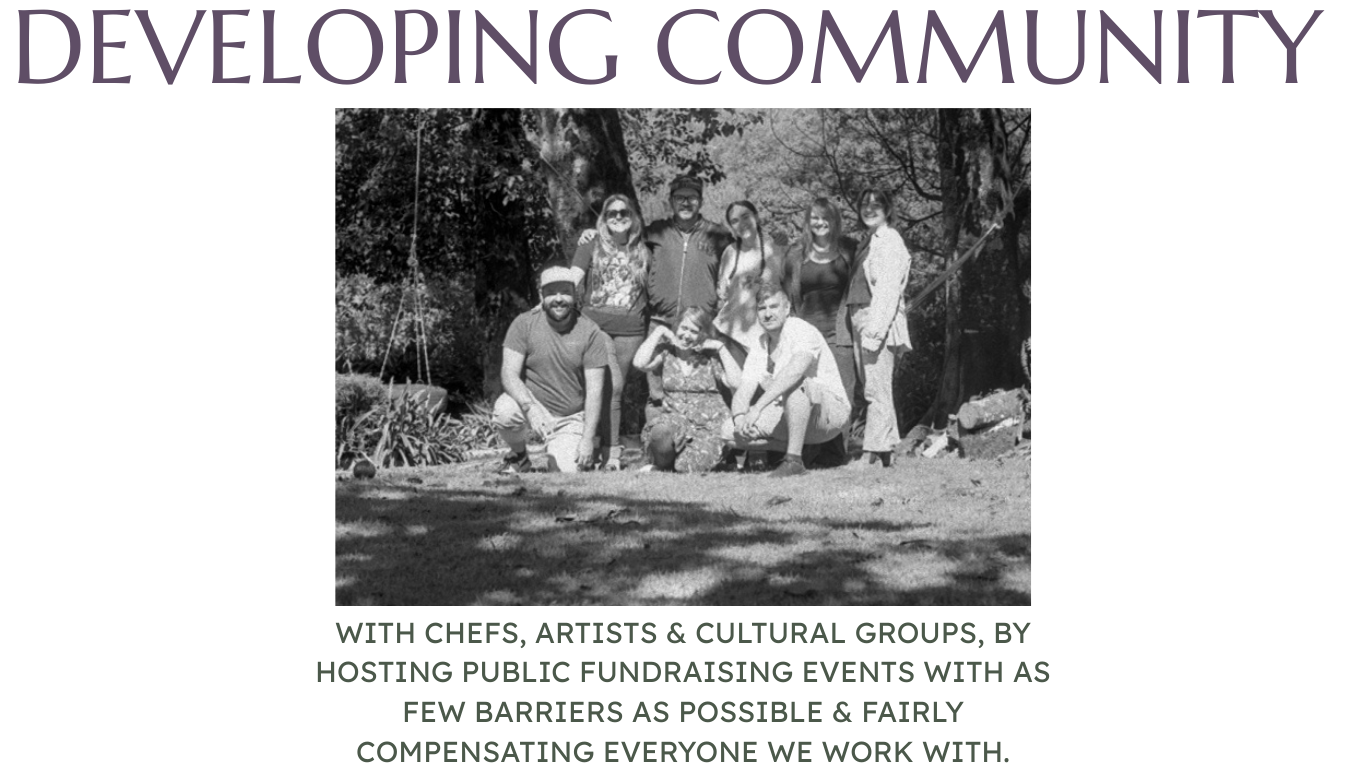 a black and white group photo of 7 people - a mix of genders and ethnicities - in the sun framed by trees - happy